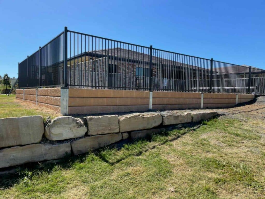 Metal Fence Beside House And Pool Front