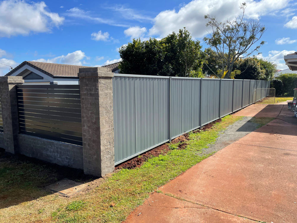 Residential House Surrounded by A Sturdy Fence