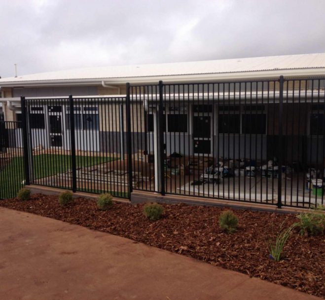 Blace Metal Fence Beside Building